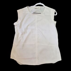 CHICO'S sleeveless shear cream blouse.